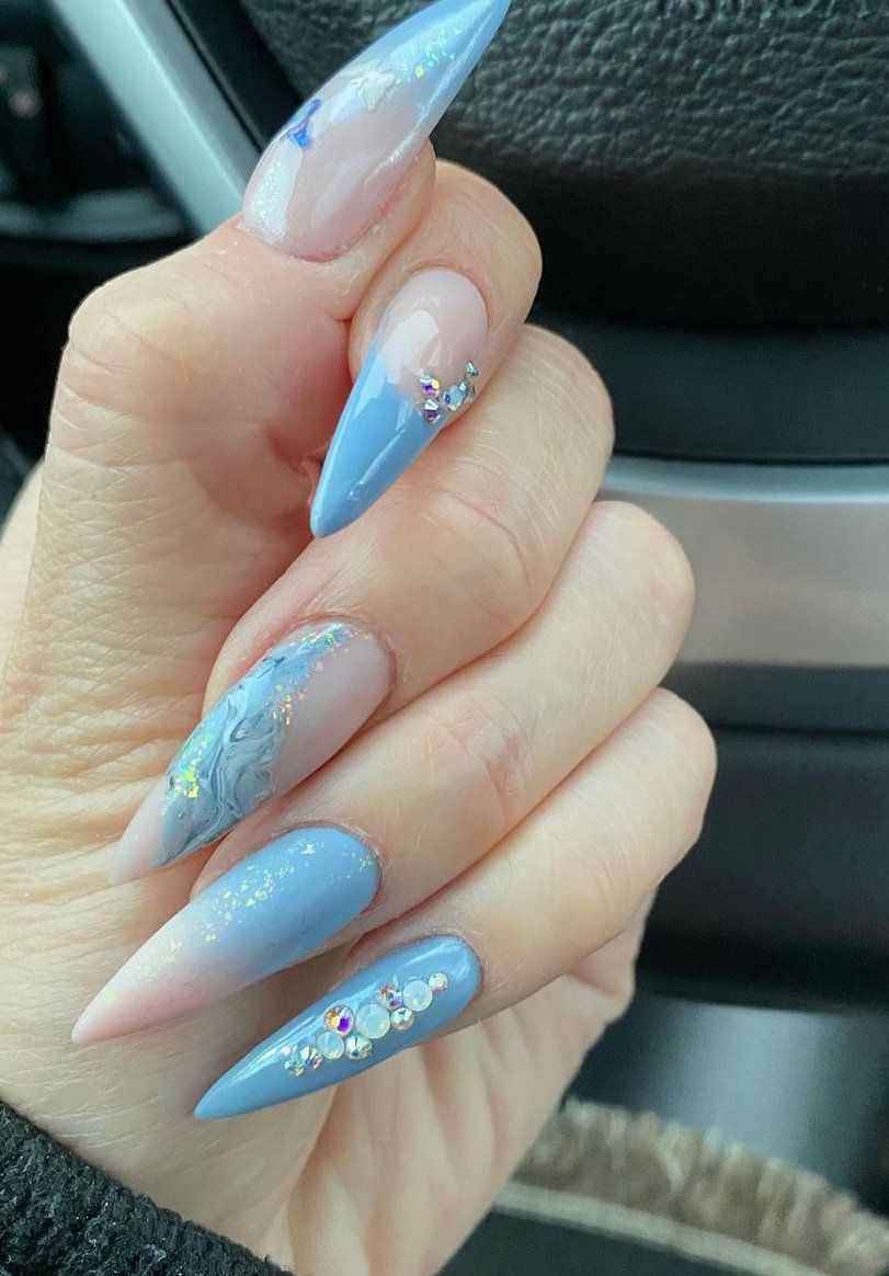 Pale blue nails with crystal detail